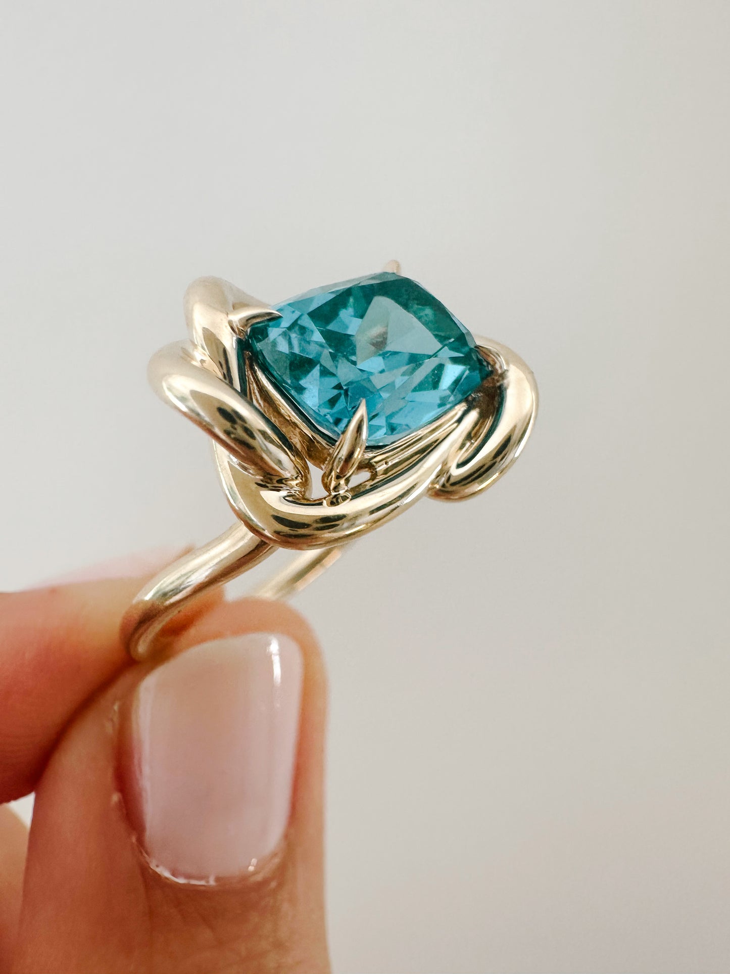 Turq Blue Infinity Knot Ring
